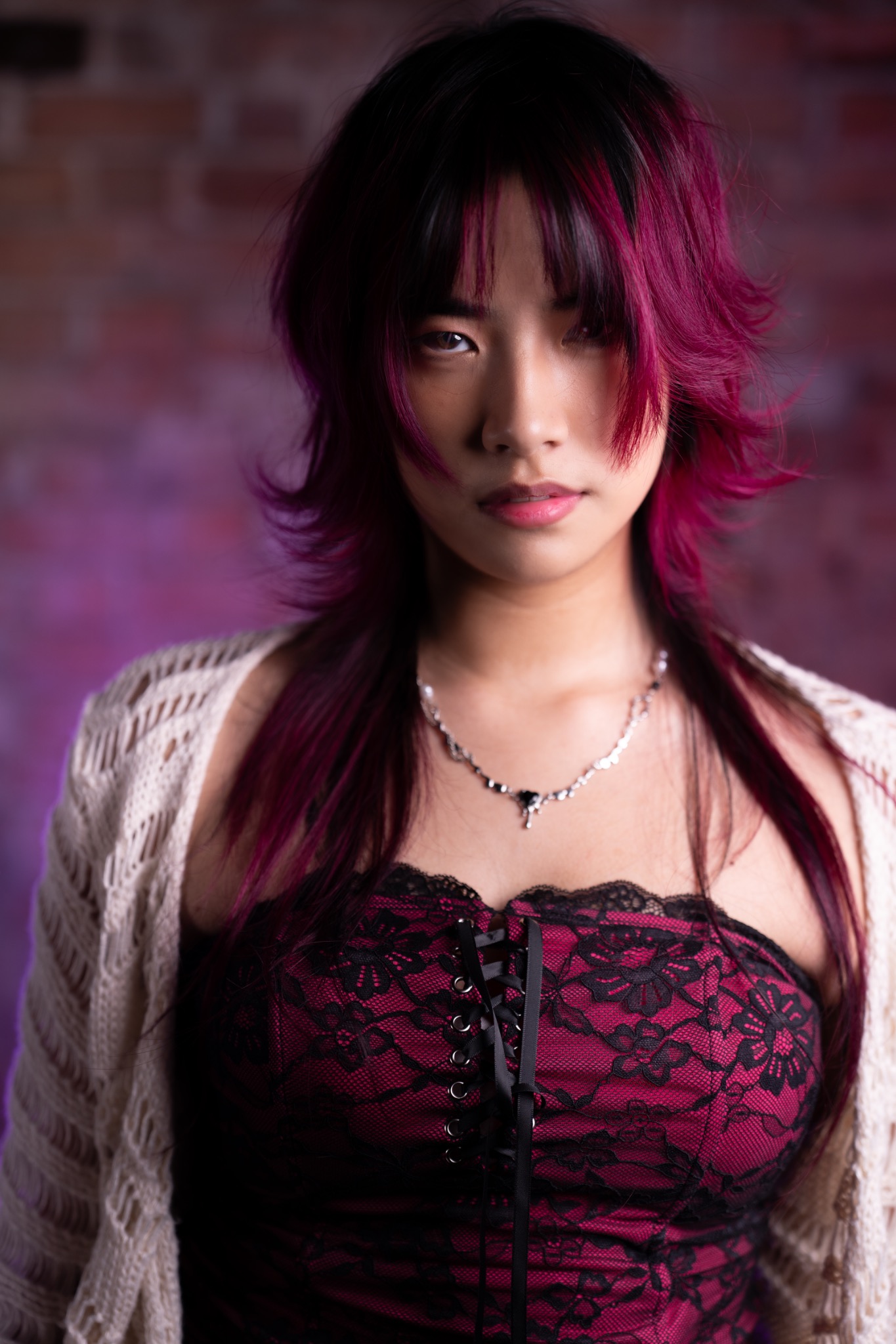 Kenn magenta and black long layered wolf cut portrait