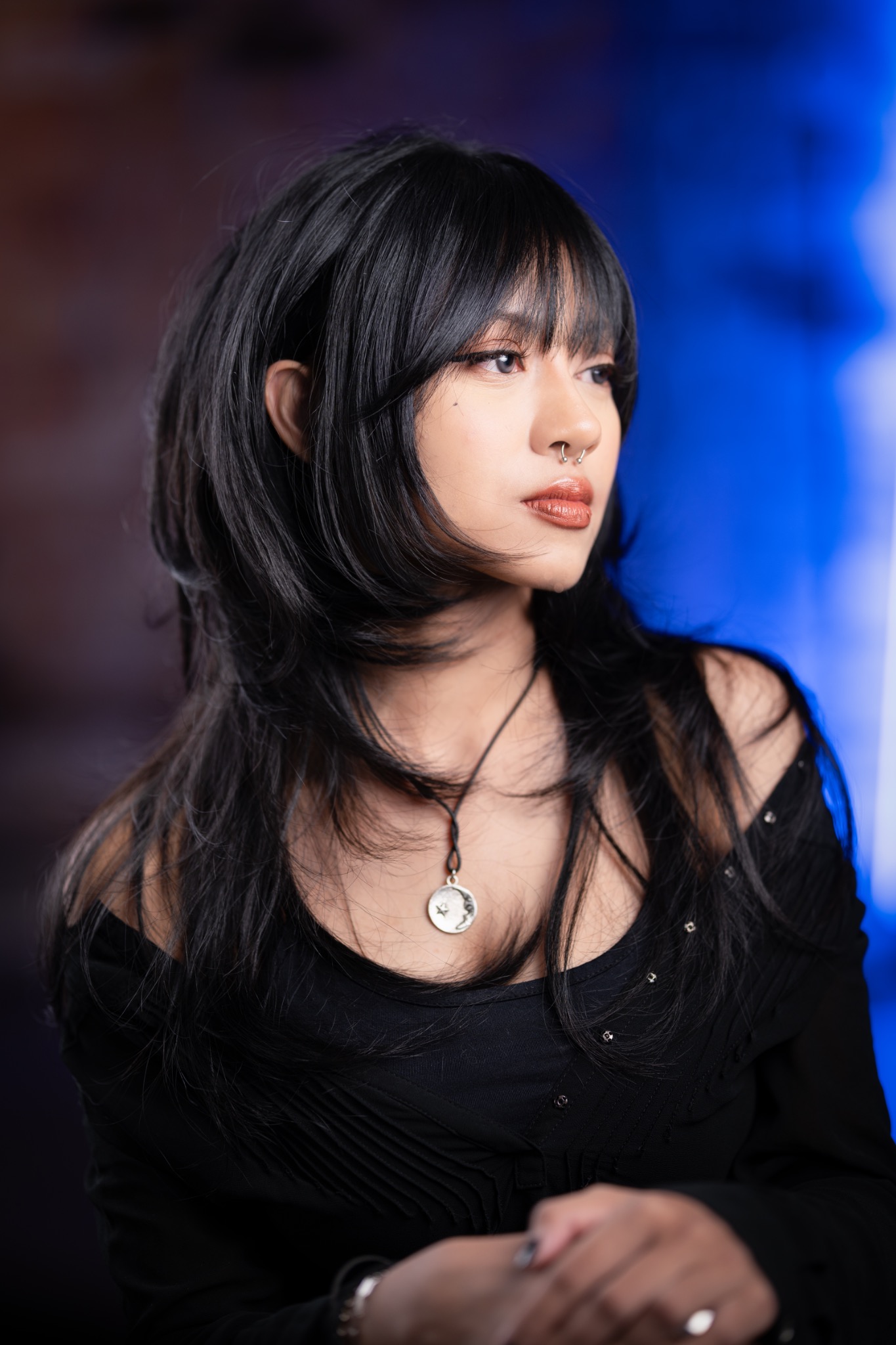 Rhea glossy black layered haircut with face framing